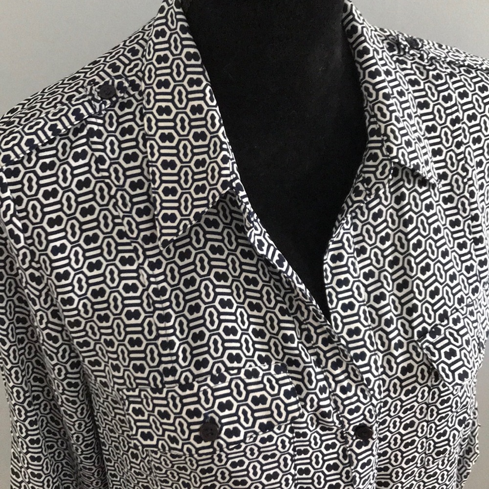 Blue and white graphic blouse. Tab details
